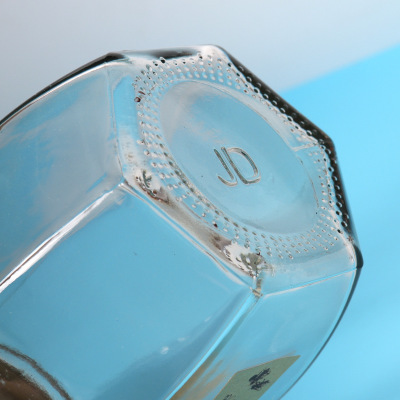 Hot sale 500ml 1000ml honey glass jar hexagonal for jam food storage tea coffee sugar salt ceramic storage jar with metal lids