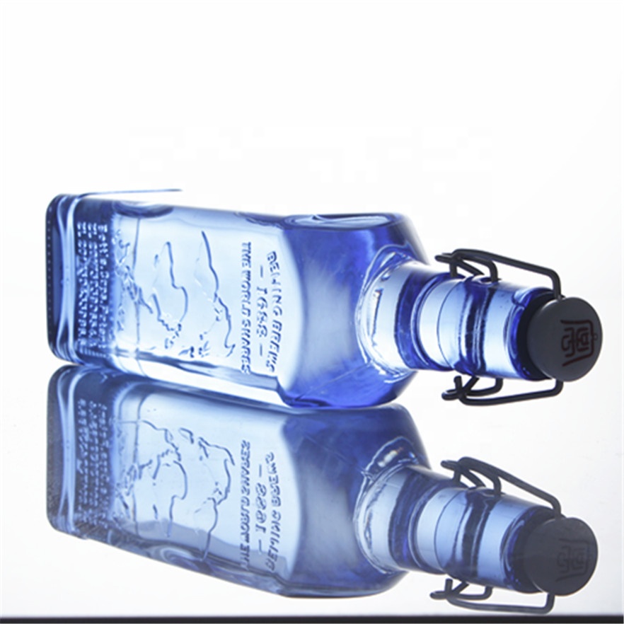 Hot sale 500ml 750ml blue swinging top empty square glass bottle
