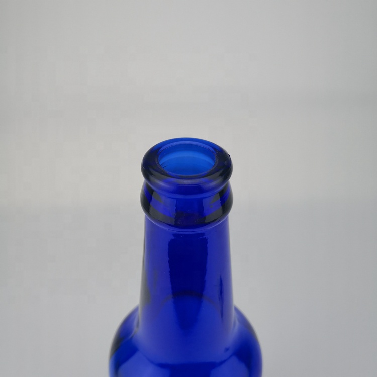 Hot sale 500ml blue long neck beer glass bottle with pry crown cap in stock