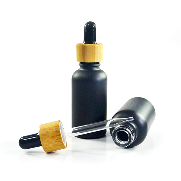 Hot sale 5ml 10ml 15ml 20ml 30ml 50ml 100ml matte frosted black essential oil glass bottle with bamboo dropper cap