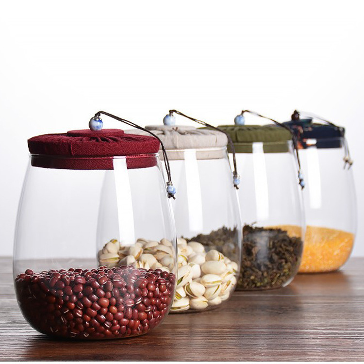 Hot sale 600ml oval glass canister with lid transparent glass tea canister