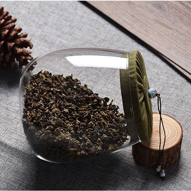 Hot sale 600ml oval glass canister with lid transparent glass tea canister