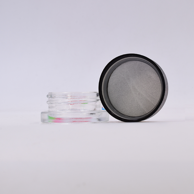 Hot sale 9 ml clear round  small  straight side eye cream cosmetic packing  glass jar with black  plastic child proof lid.