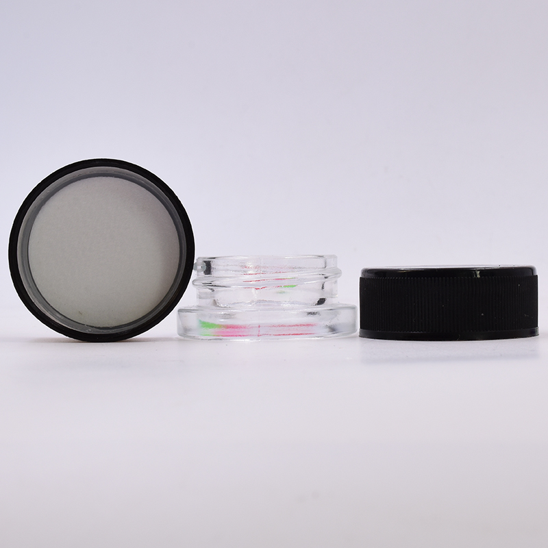 Hot sale 9 ml clear round small straight side eye cream cosmetic packing glass jar with black plastic child proof lid.