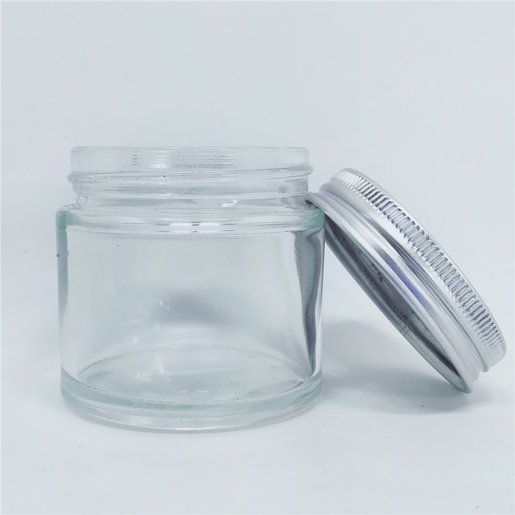 Hot sale Clear cosmetic glass jar 60g with aluminium lid