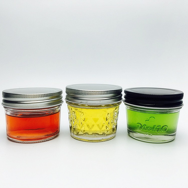 Hot sale Embossed candy jars glass wide mouth glass airtight storage small jars
