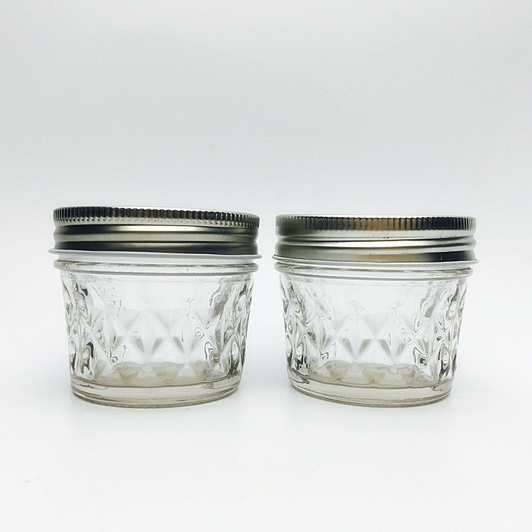Hot sale Embossed candy jars glass wide mouth glass airtight storage small jars