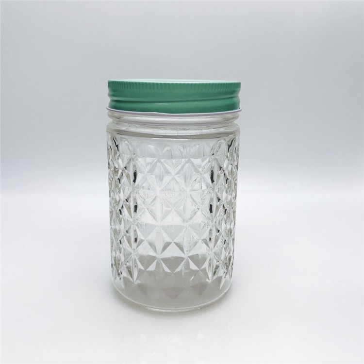 Hot sale Embossed candy jars glass wide mouth glass airtight storage small jars