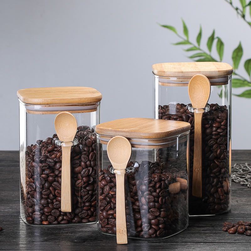 Hot sale Kitchen Storage Container Bottle Large Unique Round Sealed High Borosilicate Glass Food Storage Jar with wooden spoon