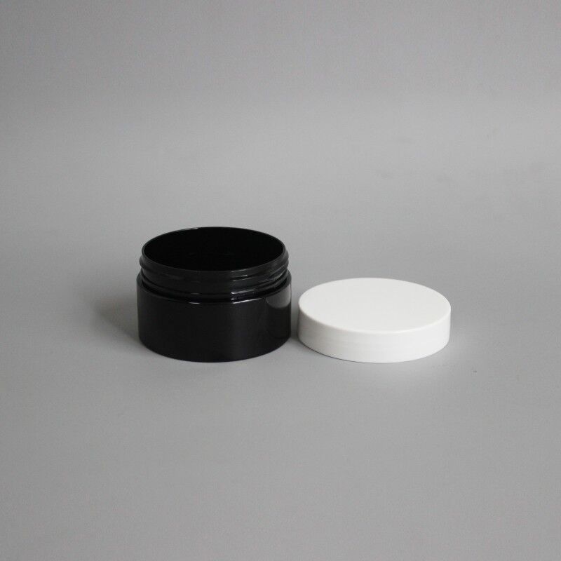 Hot sale Luxury 100 ml sealed Wide mouth matte black round shape jar with white lid