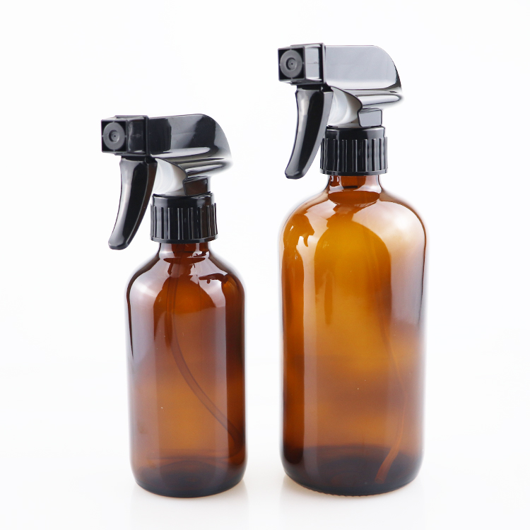 Hot sale amber boston round glass spray oil bottle with trigger sprayer 16oz