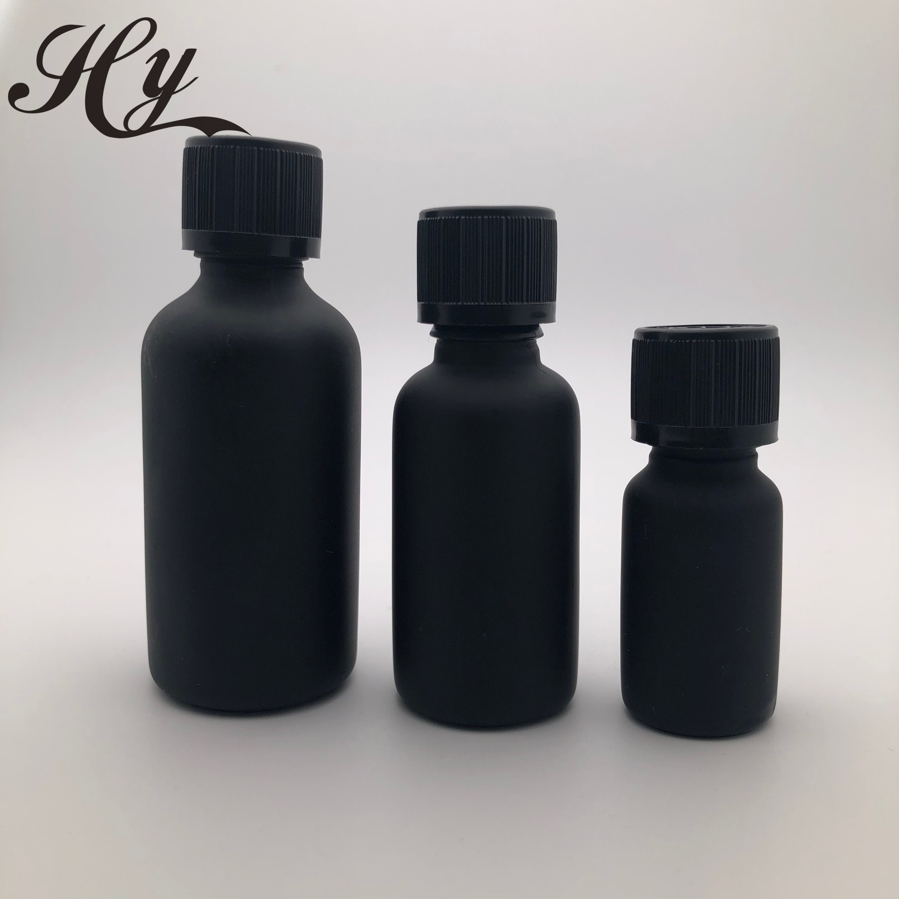 Hot sale black cosmetic essential oil glass bottle with screw cap