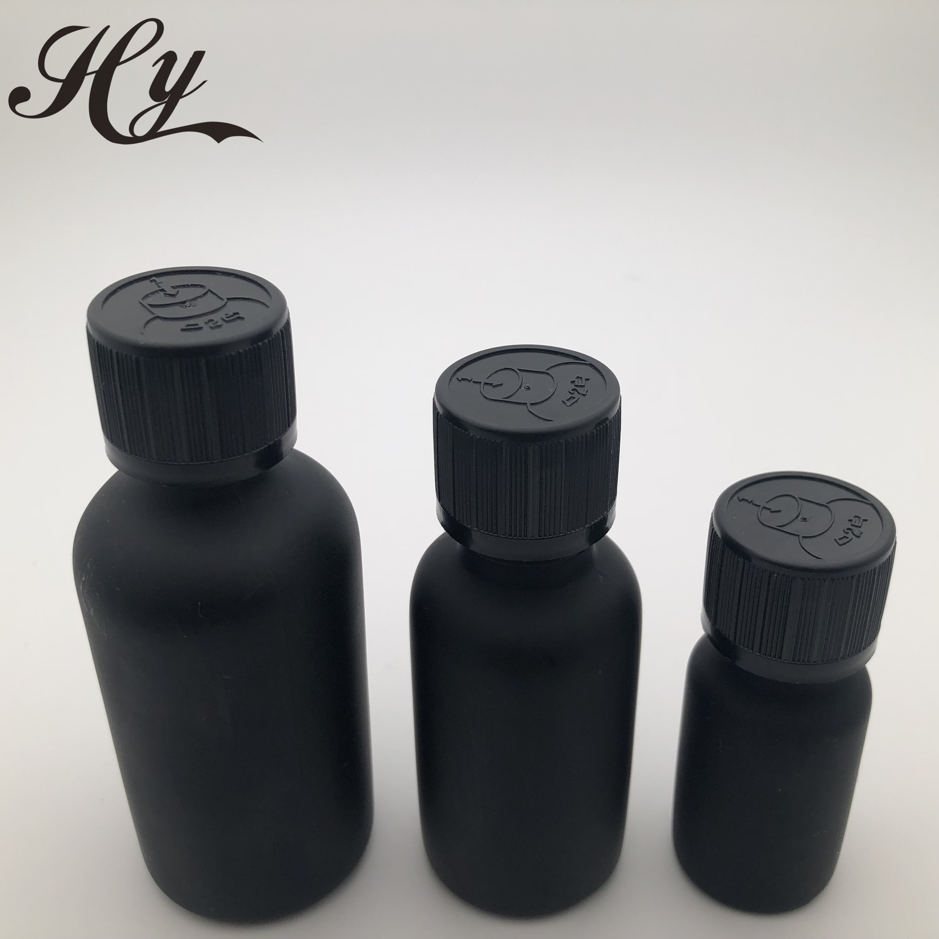 Hot sale black cosmetic essential oil glass bottle with screw cap