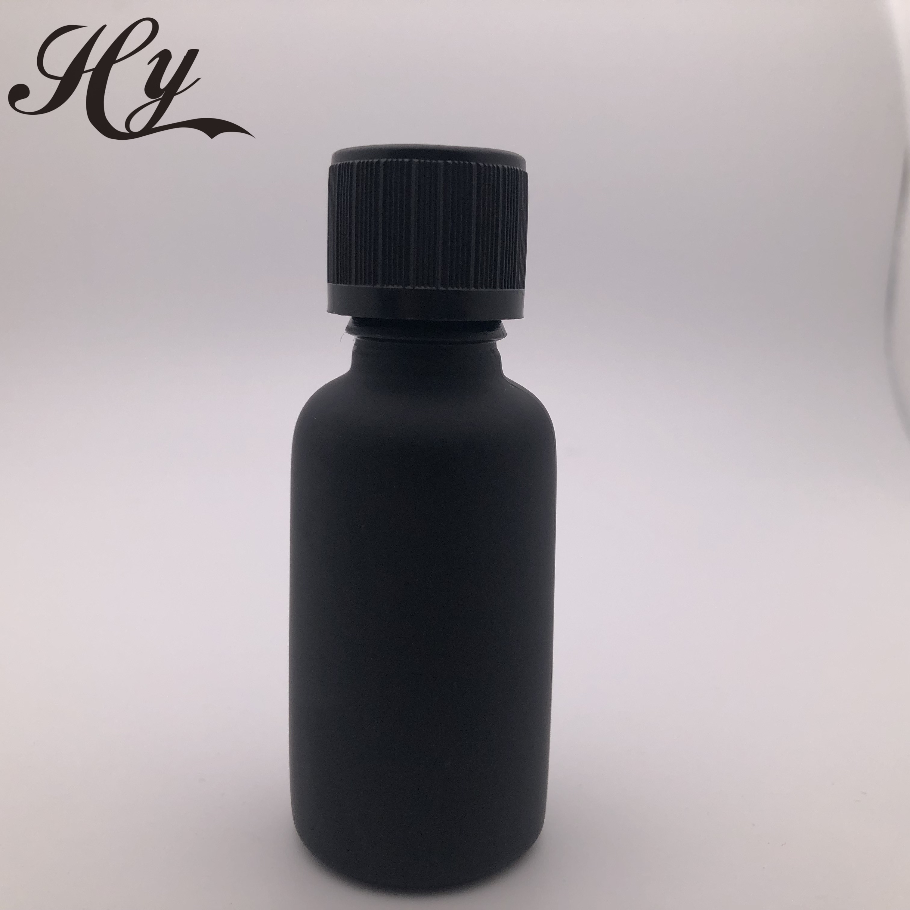 Hot sale black cosmetic essential oil glass bottle with screw cap