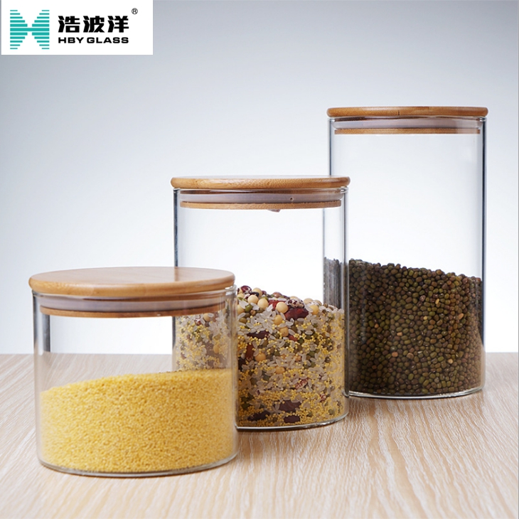 Hot sale borosilicate clear glass bottle bamboo cover for flower tea candy food storage glass jar
