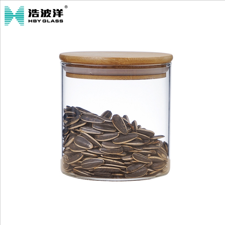 Hot sale borosilicate clear glass bottle bamboo cover for flower tea candy food storage glass jar