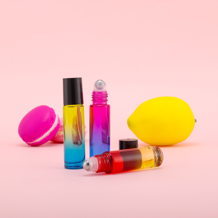 Hot sale clear amber green blue roll on lip gloss bottles 4ml 6ml 8ml 10ml glass roller bottle with plastic roller ball