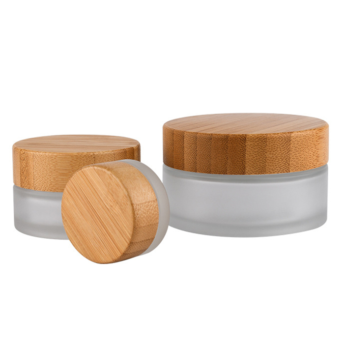 Hot sale cosmetic face cream container 5ml 15ml 30ml 50ml 100ml frosted clear glass jar with bamboo wood lid