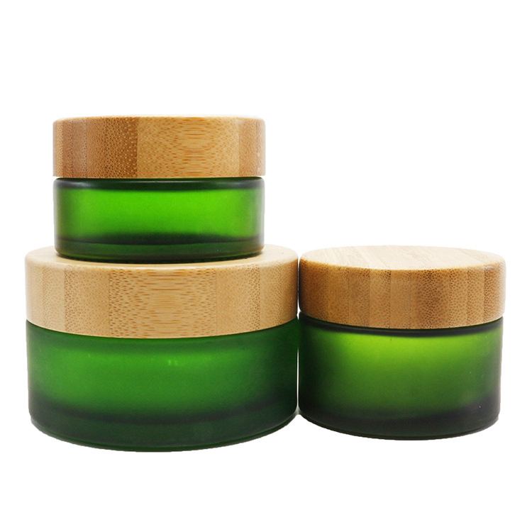 Hot sale cosmetic face cream container 5ml 15ml 30ml 50ml 100ml frosted clear glass jar with bamboo wood lid