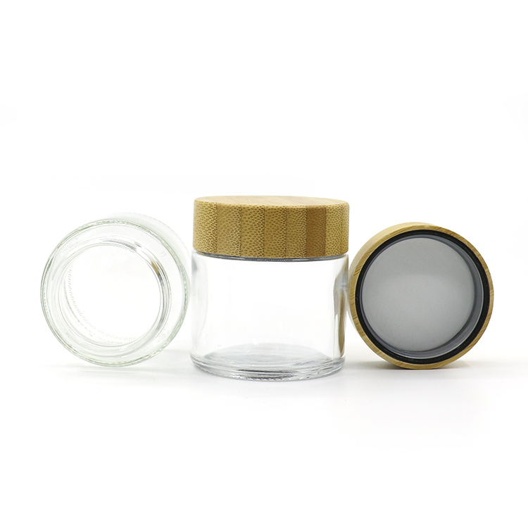 Hot sale cosmetic face cream container 90ml frosted clear glass jar with bamboo wood lid