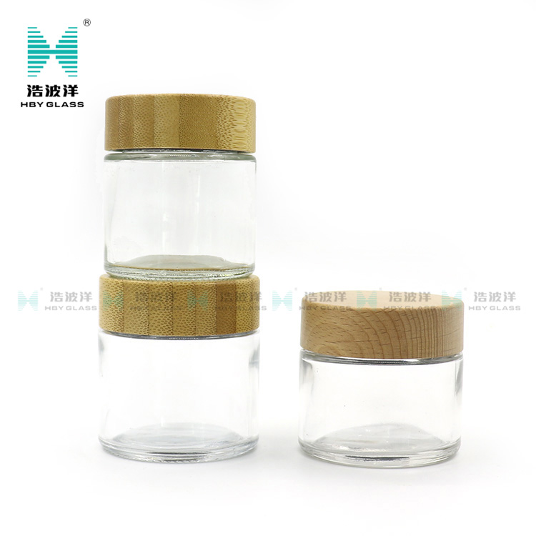 Hot sale cosmetic face cream container 90ml frosted clear glass jar with bamboo wood lid