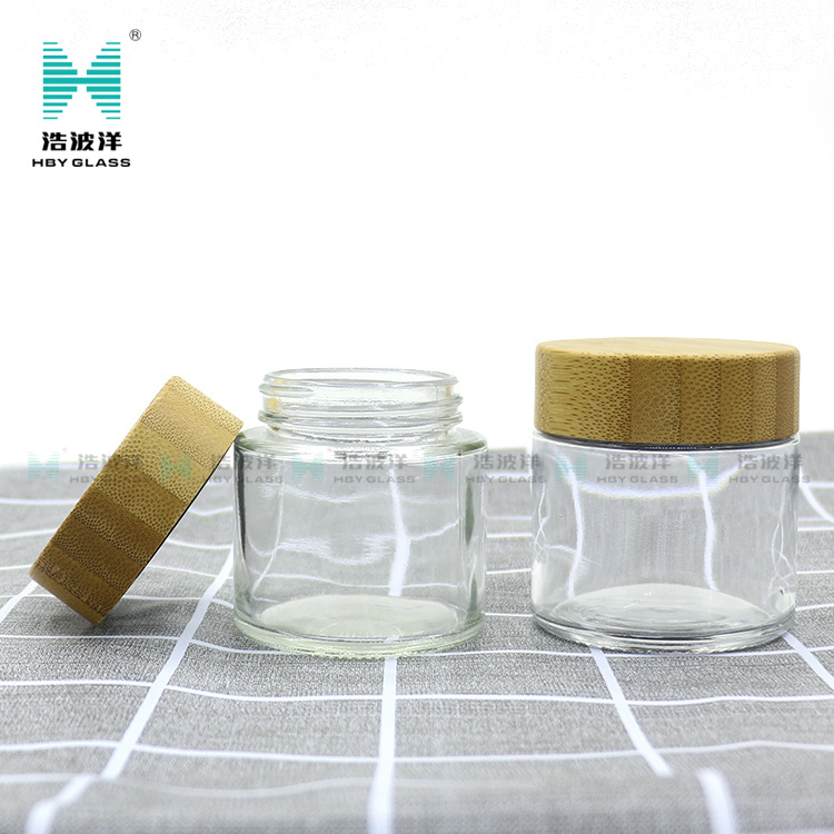 Hot sale cosmetic face cream container 90ml frosted clear glass jar with bamboo wood lid