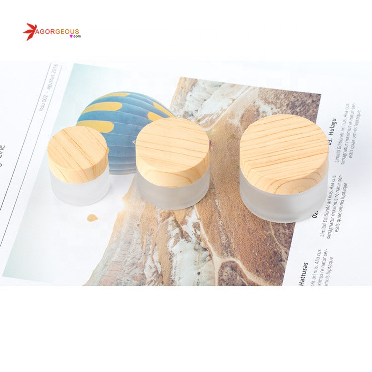 Hot sale cosmetic package glass bottle with bamboo cap empty cosmetic jars
