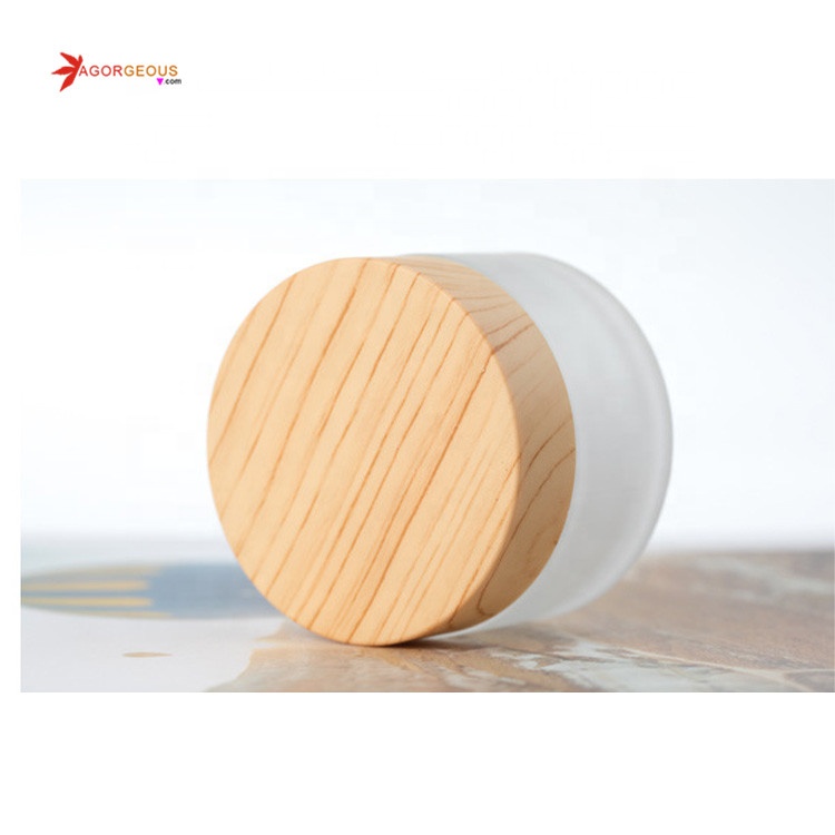 Hot sale cosmetic package glass bottle with bamboo cap empty cosmetic jars
