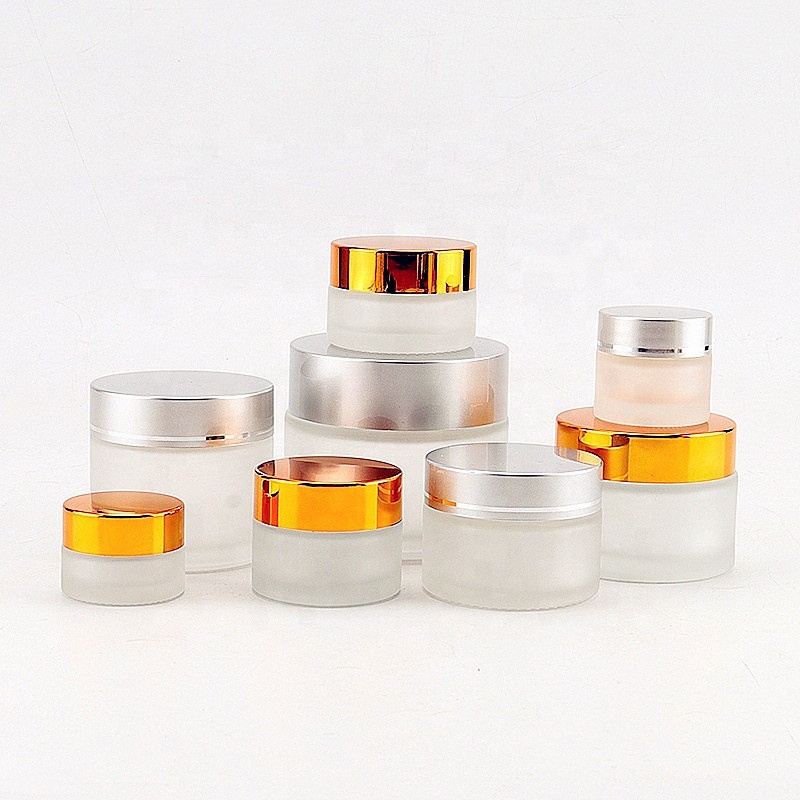 Hot sale custom logo 50g 100g empty matt frosted glass gosmetic jars gold top 30ml 50ml
