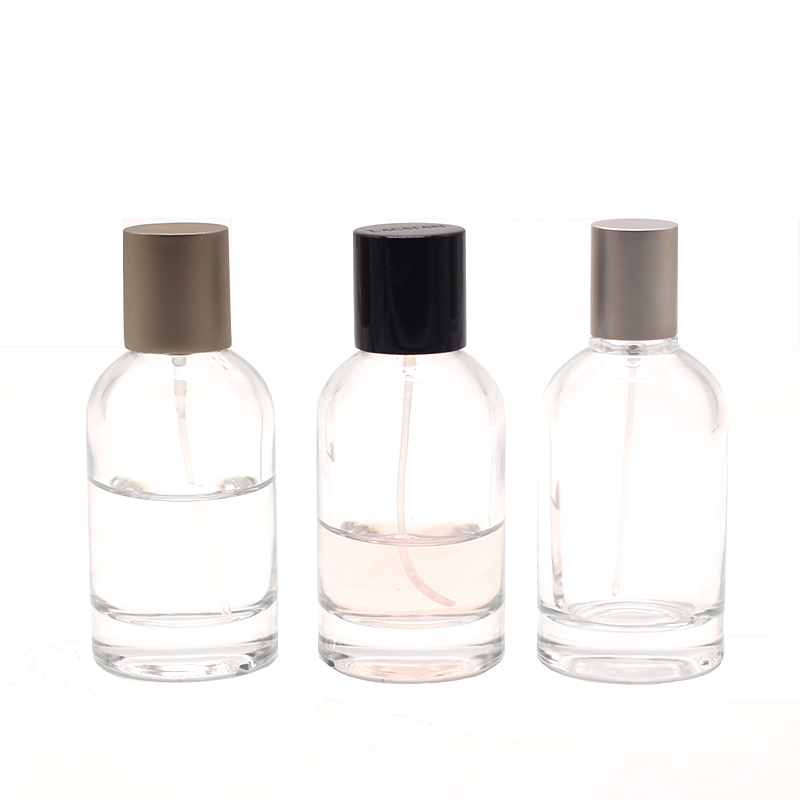Hot sale cylinder perfume bottles 50ml 100ml with vaporisateur spray santal 33