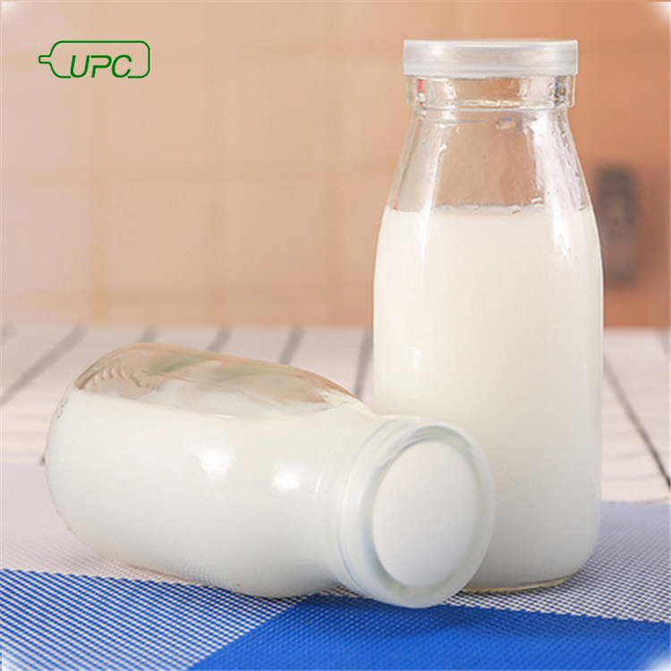 Hot sale design size clear empty 10ml 100ml glass bottle milk