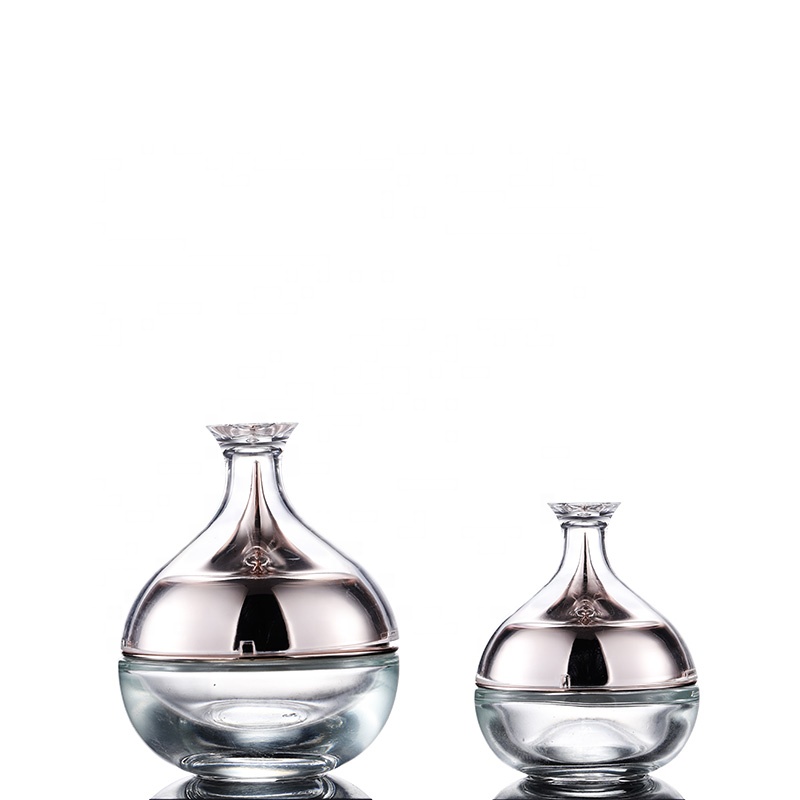 Hot sale glass cosmetic jar packaging 30g 50g transparent glass cream jar translucent glass jar 50g with unique shape cap