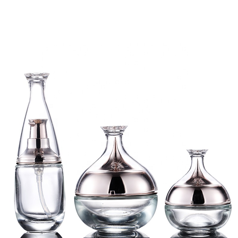 Hot sale glass cosmetic jar packaging 30g 50g transparent glass cream jar translucent glass jar 50g with unique shape cap