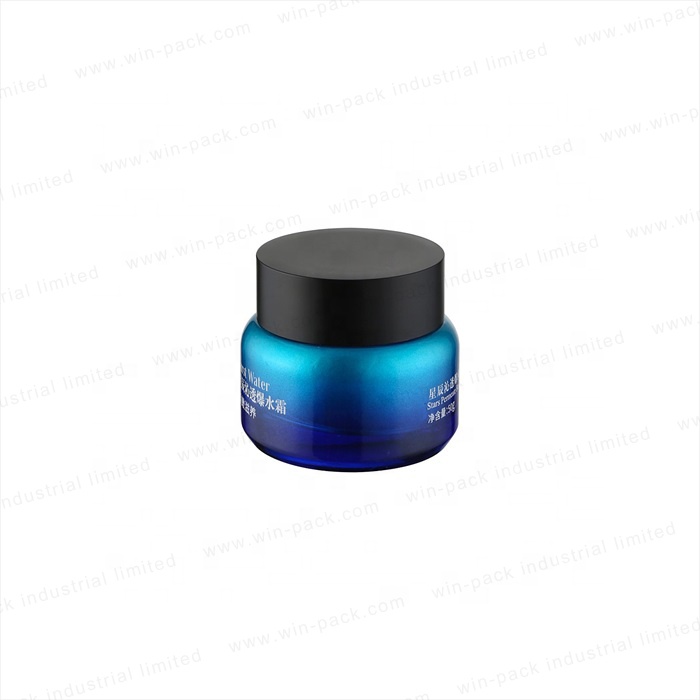 Hot sale glass lotion bottle and jar transparent blue color round shoulder toner bottle 40ml serum container and 50g jar