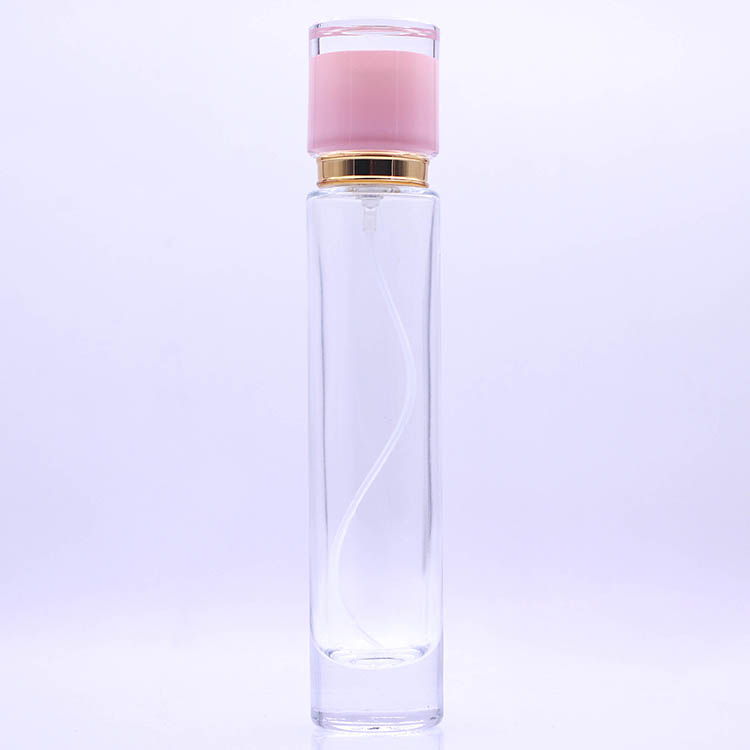 Hot sale height perfume 50ml glass bottle with gold pump and different color cap