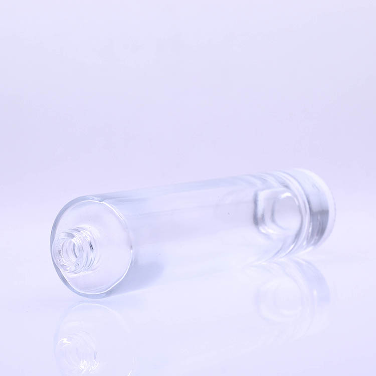 Hot sale height perfume 50ml glass bottle with gold pump and different color cap
