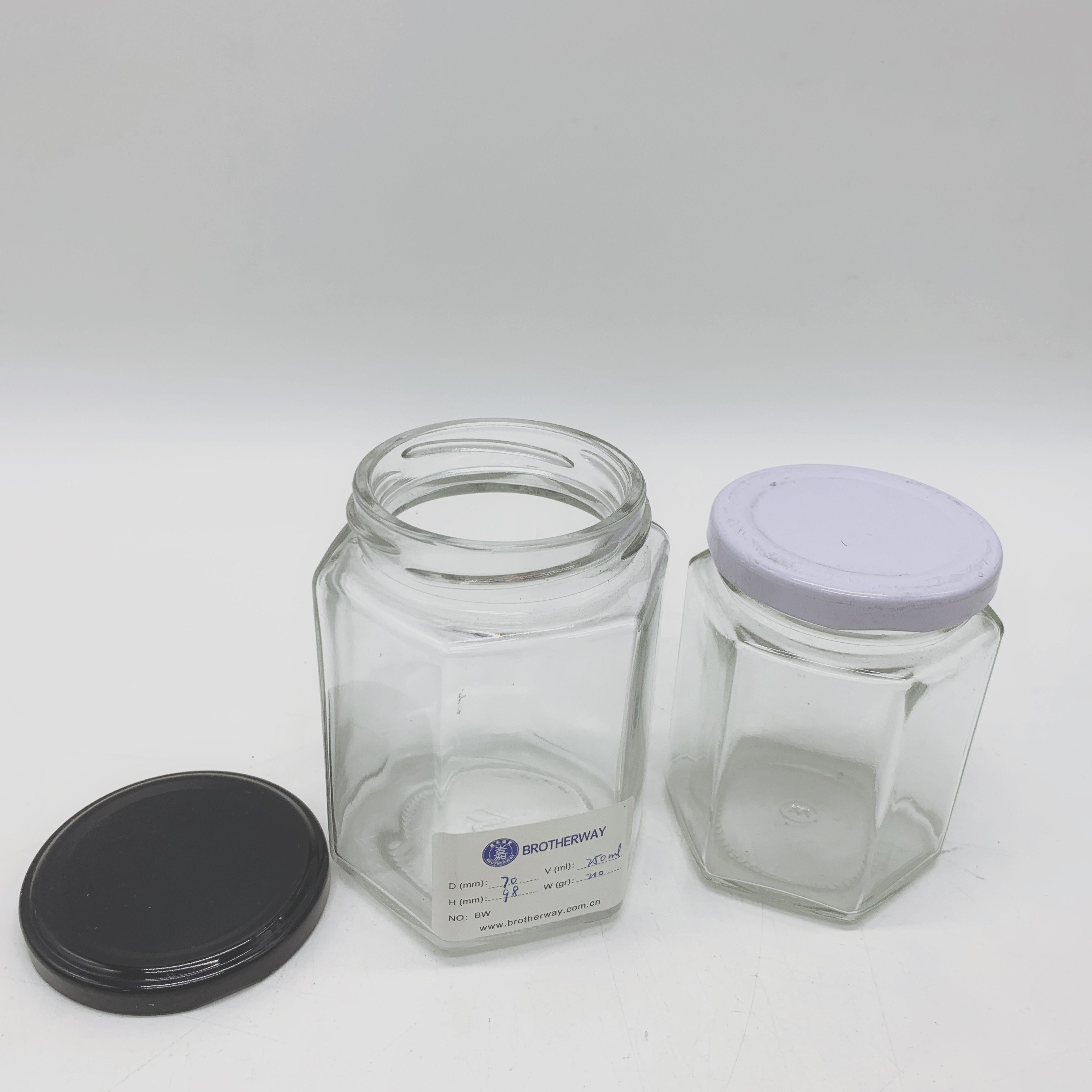 Hot sale high quality Hexagon glass honey jars with Metal Lid
