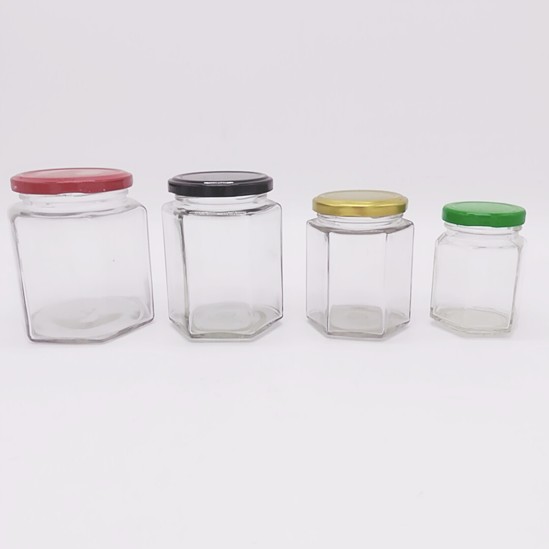 Hot sale high quality Hexagon glass honey jars with Metal Lid