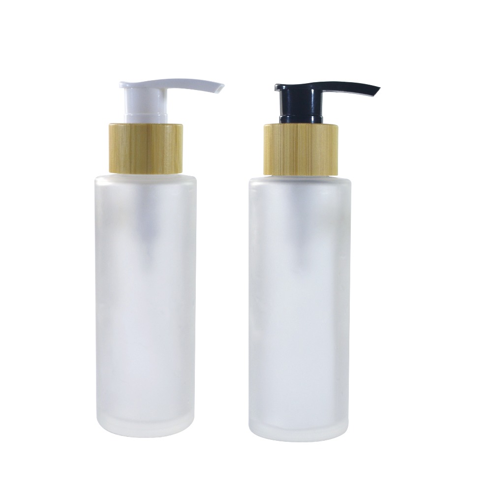 Hot sale luxury bamboo cosmetic packaging  30ml 50ml 100ml frosted clear glass bottle with bamboo caps