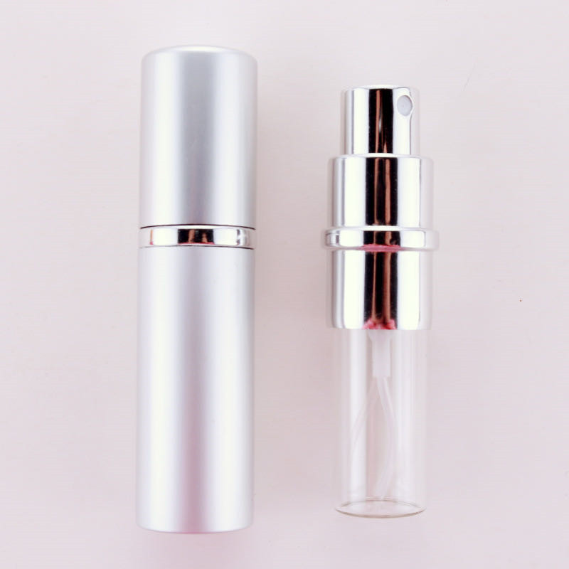 Hot sale mini travel pack 10  ml sliver round perfume sample  cosmetics into small glass tank with  aluminum oxide and  spray