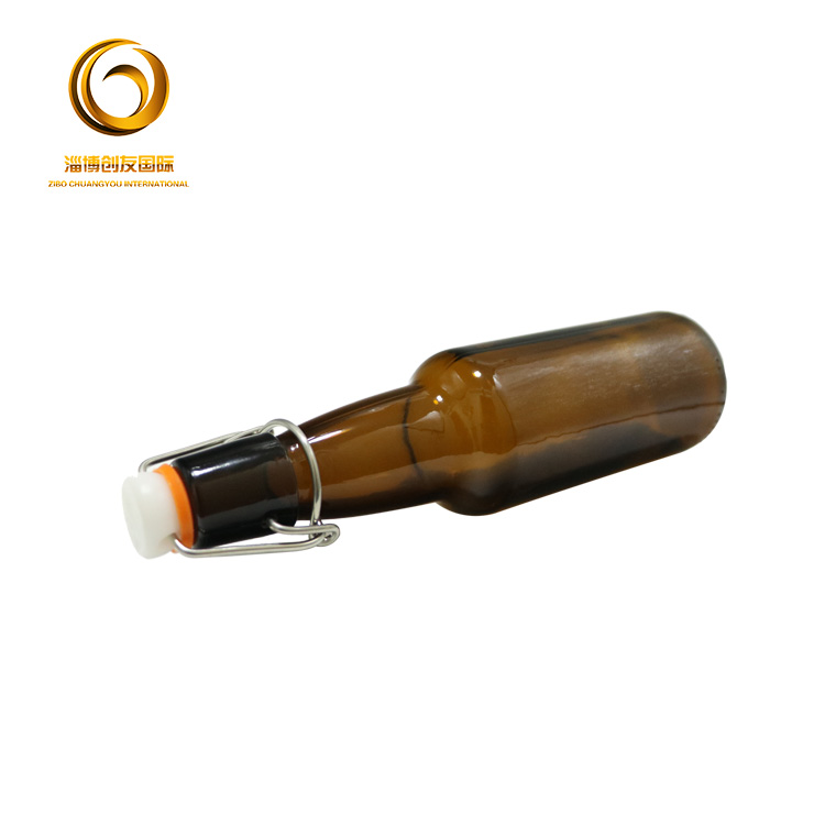 Hot sale new design 330ml beer glass bottle with swing top