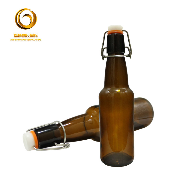 Hot sale new design 330ml beer glass bottle with swing top