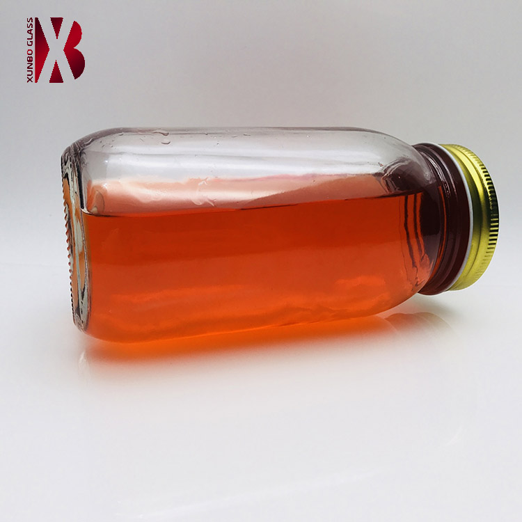 Hot sale round shape 750 ml mango butter glass jar with metal lid