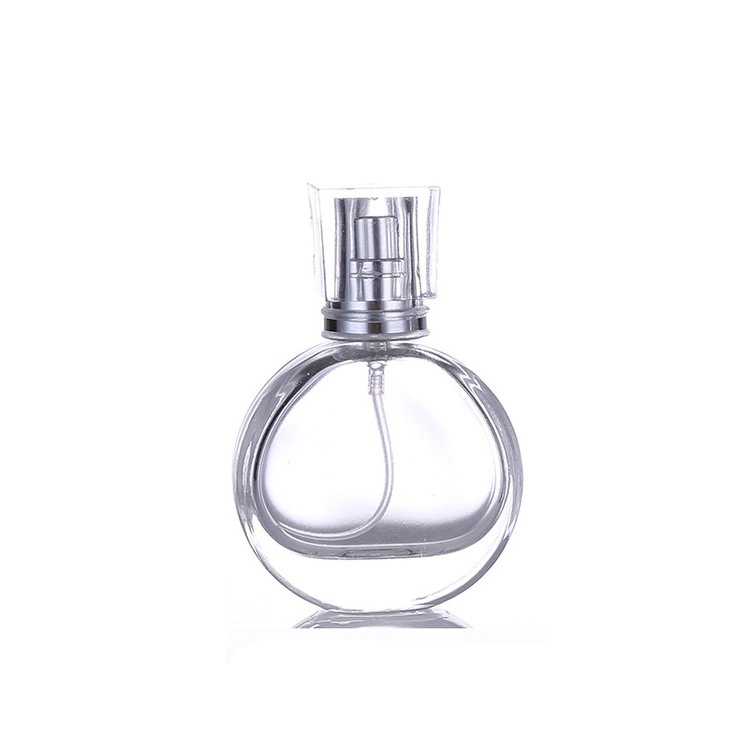 Hot sale woman use crimping pump glass perfume bottle 25ml round shape perfume bottle white color