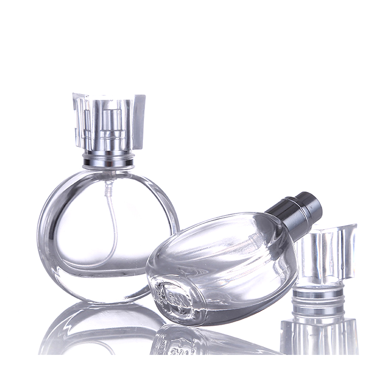 Hot sale woman use crimping pump glass perfume bottle 25ml round shape perfume bottle white color