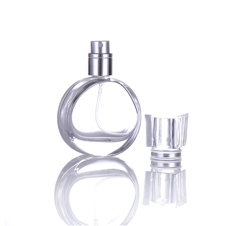 Hot sale woman use crimping pump glass perfume bottle 25ml round shape perfume bottle white color