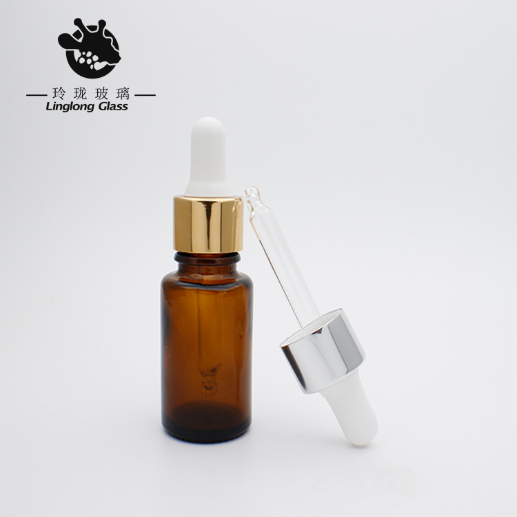 Hot sales 15 ml essential oil bottles with glass dropper and with middle hole cover