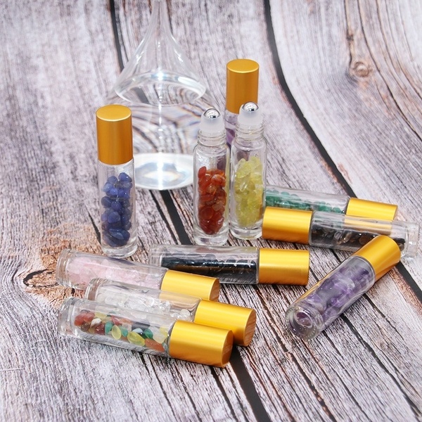 Hot sales 2020 clear glass roller ball bottles 10ml with crystal gem stones for essential oil