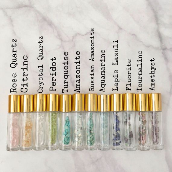 Hot sales 2020 clear glass roller ball bottles 10ml with crystal gem stones for essential oil