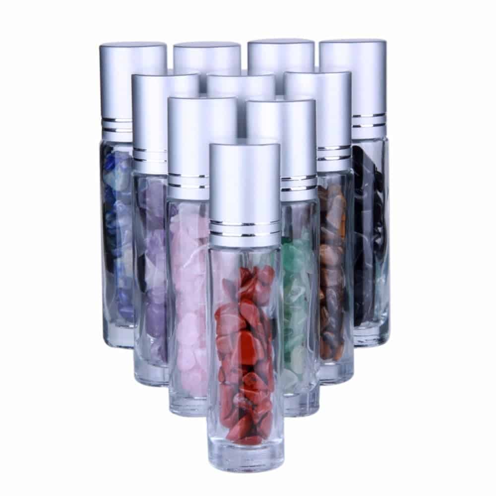 Hot sales 2020 clear glass roller ball bottles 10ml with crystal gem stones for essential oil